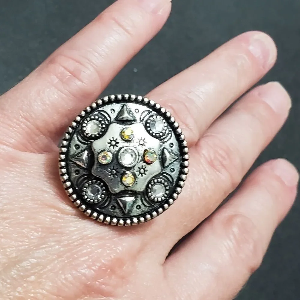 Silver tone circular sparkly ring